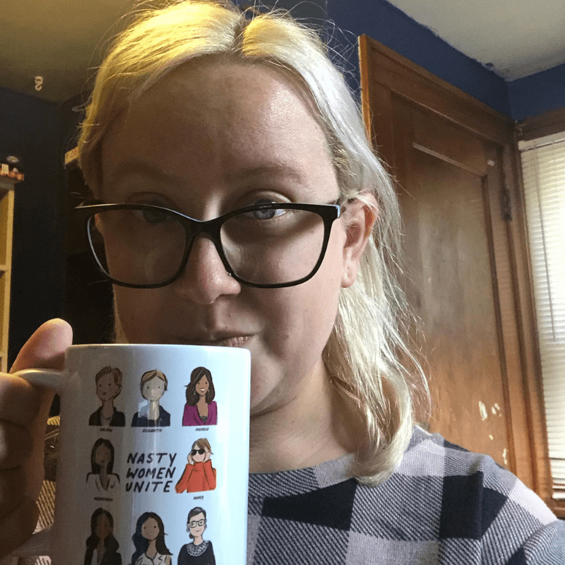 Sarah with Nasty Women Unite coffee mug